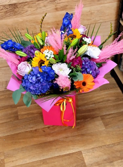 Bright bloom - Mixed bright fresh flowers arranged in aqua box